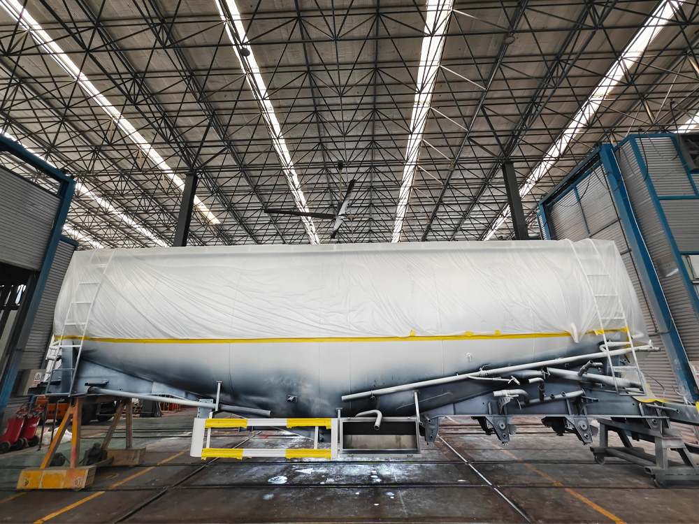 Bulk cement trailer being painted in the factory